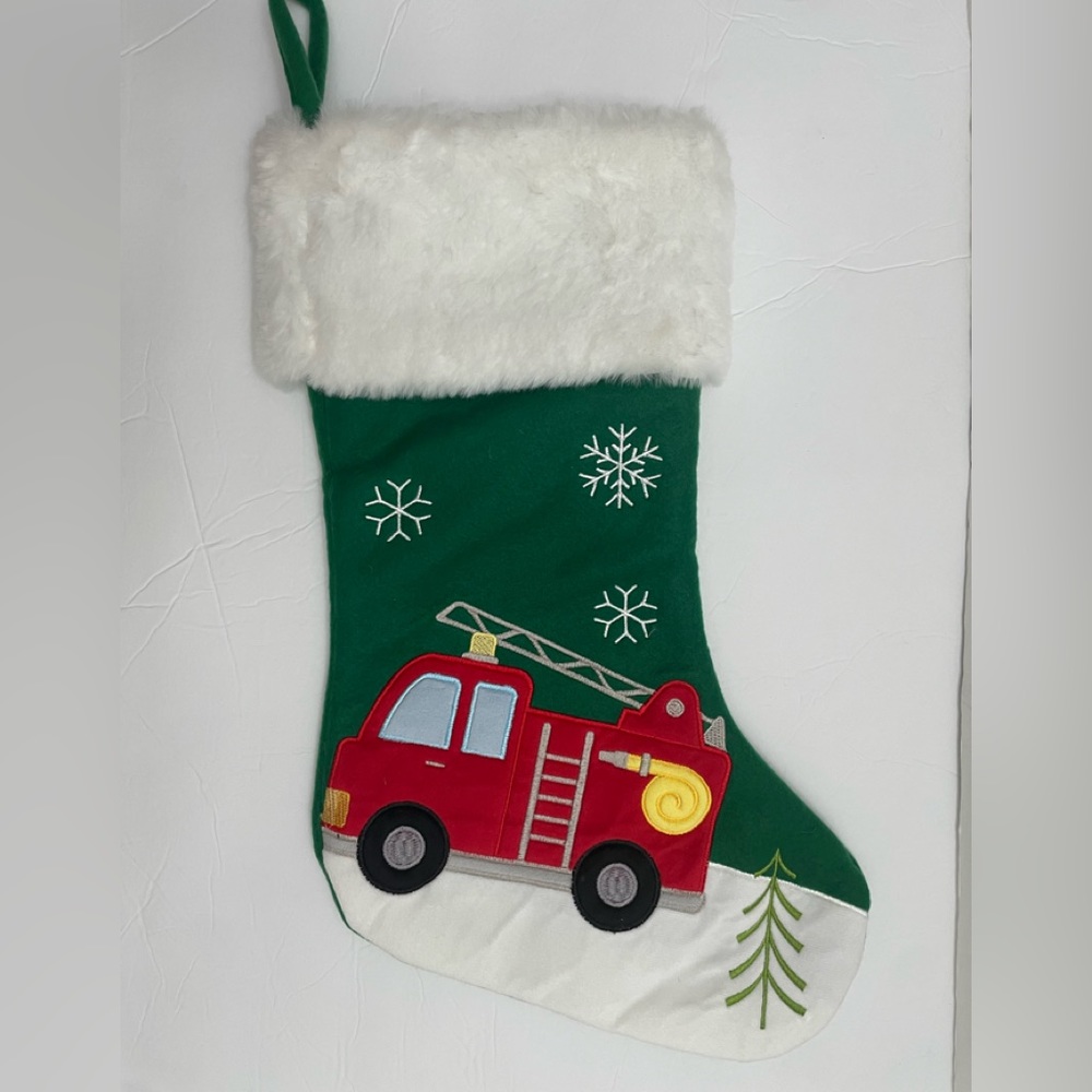 New , never used embroidered stocking. Fire truck.